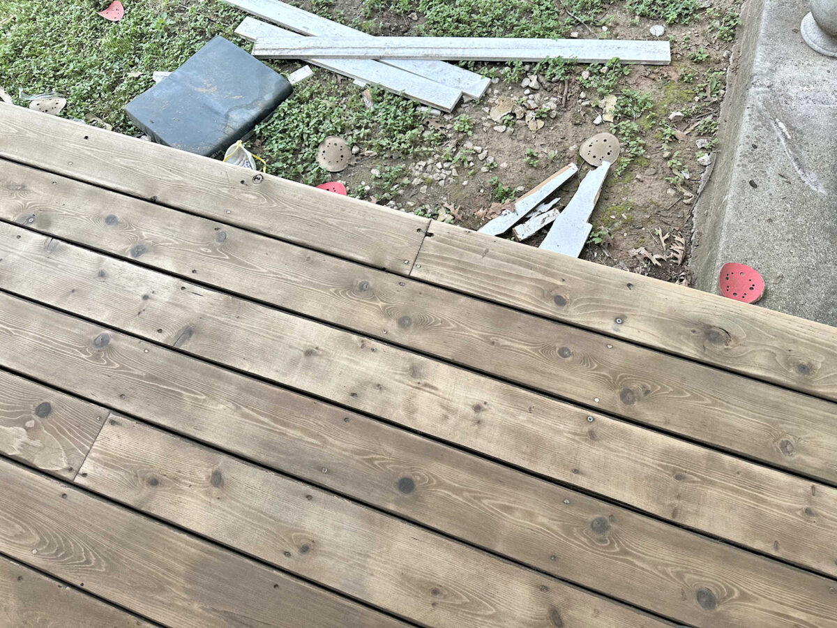 Cedar deck porch sanded and ready for new finish -- why I decided to paint instead of re-stain or re-seal