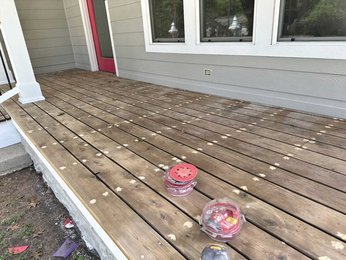 Prepping my cedar front porch for pine tar and linseed oil - filling screw holes with natural solvent wood filler