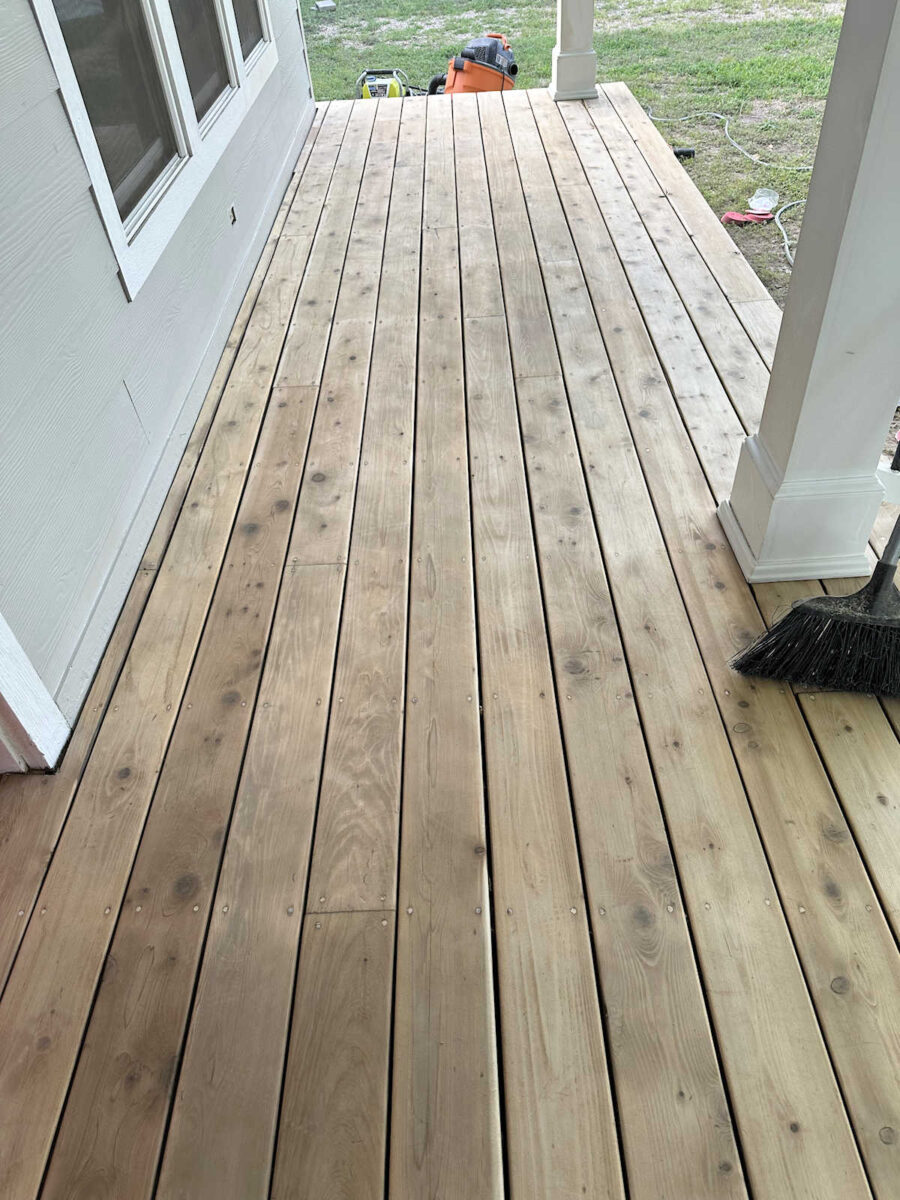 Cedar front porch prepped for pine tar and linseed oil application