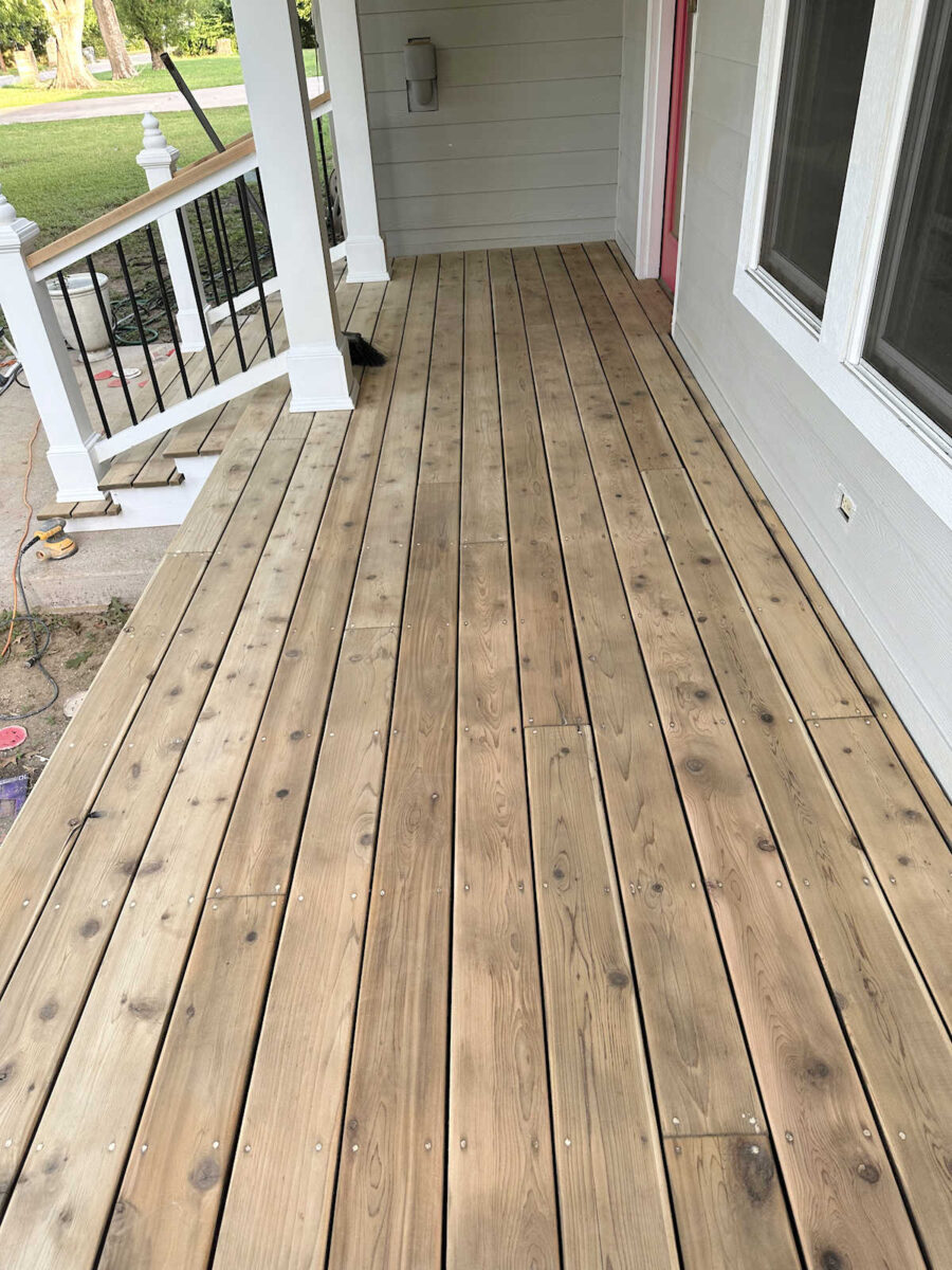 Cedar front porch prepped for pine tar and linseed oil application