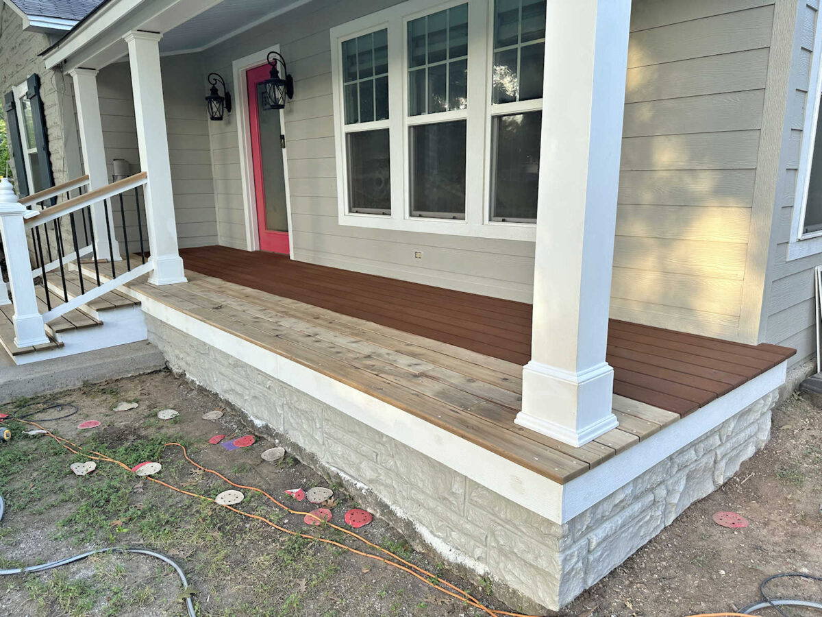 First coat of authentic brown (dark brown) pine tar on my cedar front porch